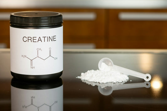 Creatine supplement bottle and scoop